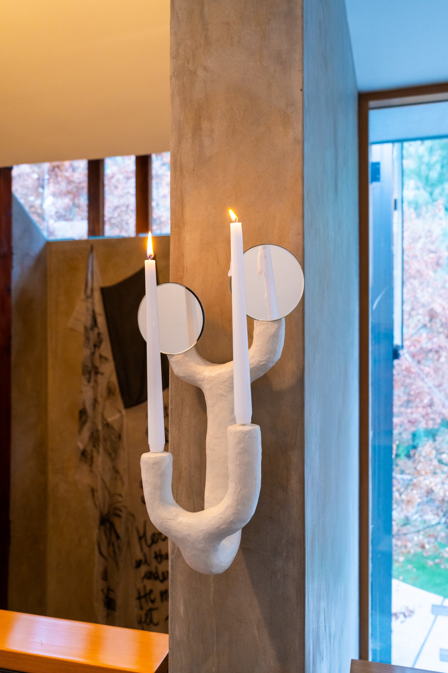 Luminous Limbs Candle Sconce