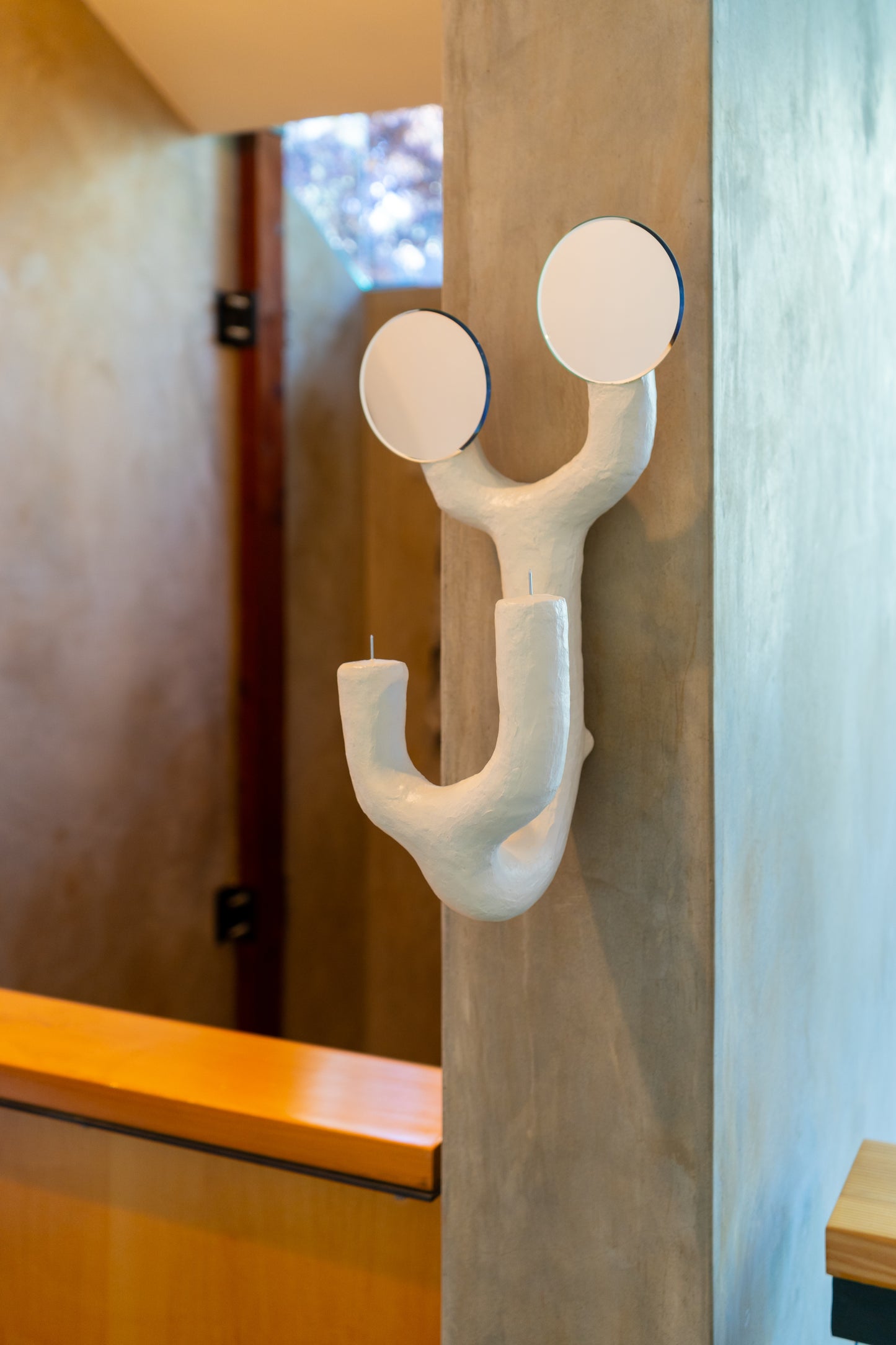 Luminous Limbs Candle Sconce